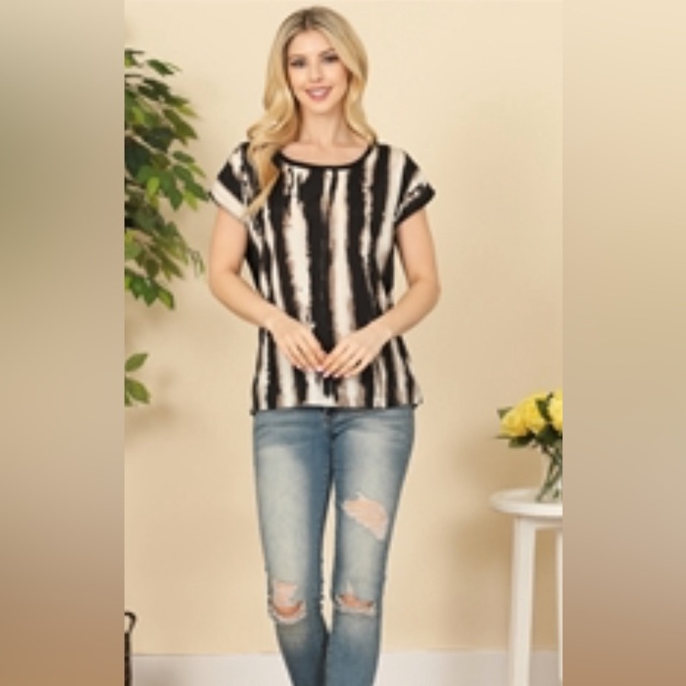 B leve Brand cutout back black and cream top.